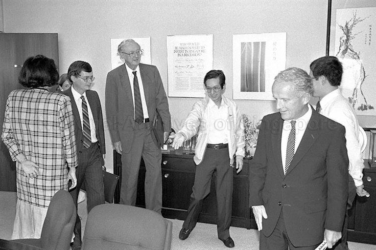 Australian Minister for Industry Technology and Commerce John Button meets Chairman of Economic Development Board Philip Yeo Liat Kok (fourth from left) at World Trade Centre during the Australian Minister's visit to Singapore. Third from left is Australian High Commissioner to Singapore Walter Philip John Handmer.