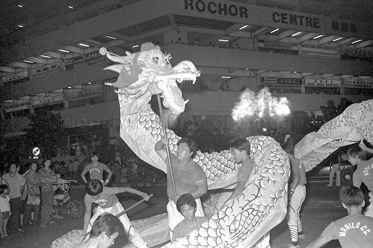 Dragon dance display at Rochore 1980 Exposition at Rochore Road opened by Minister for Health Dr Toh Chin Chye