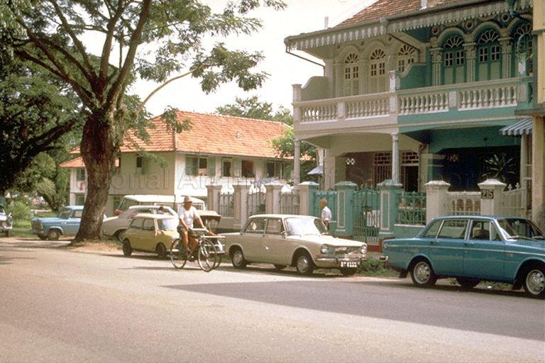 View of part of a row of three shophouses at 211 to 215 Rangoon Road