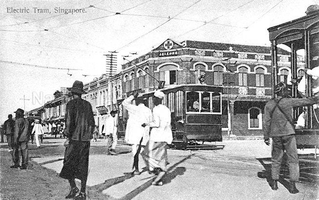 Electric tram at the junction of North Bridge Road with Bras Basah Road 1908. Photo from National Archives