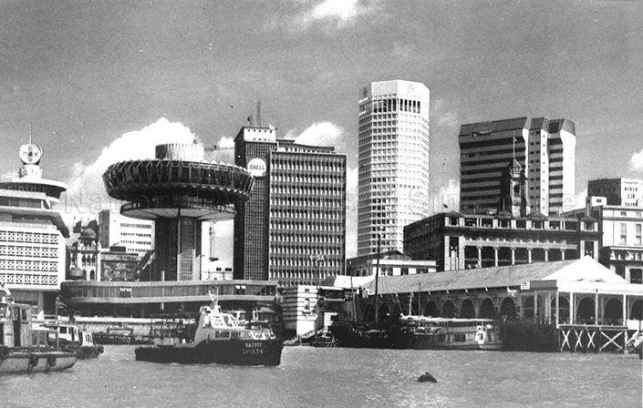 View of Singapore's Central Business District waterfront with Change Alley Aerial Plaza (second from left), Shell House, United Overseas Bank (UOB) building (now known as UOB Plaza Two), Maritime House and Clifford Pier (right foreground).