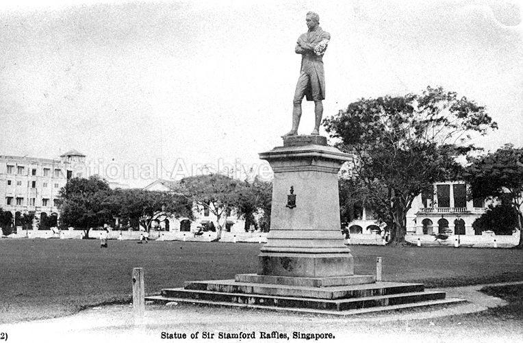 Statue of Sir Stamford Raffles at its first location at the Padang (then known as the Esplanade), Singapore, between St Andrew's Road and Connaught Drive, and facing the sea
