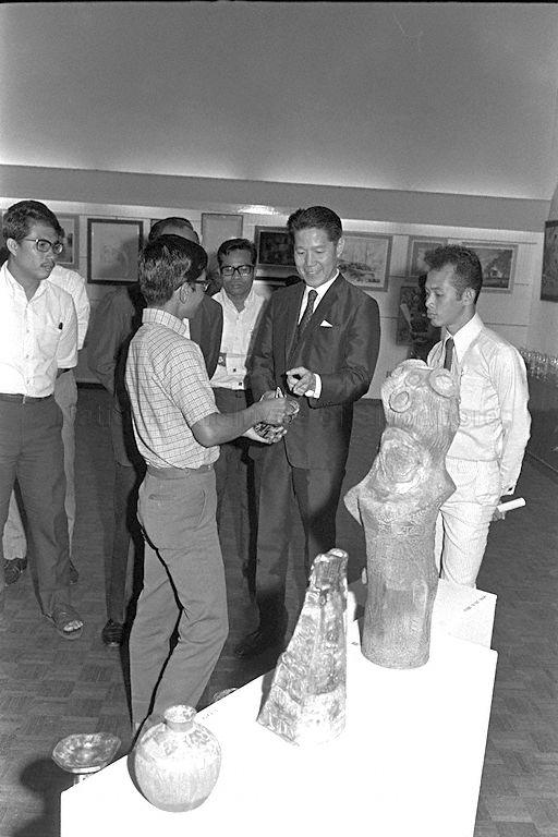 Minister for Culture Jek Yeun Thong viewing exhibits at National Library lecture hall during opening of fifth art exhibition by Association of Artists of Various Resources (Angkatan Pelukis Aneka Daya)