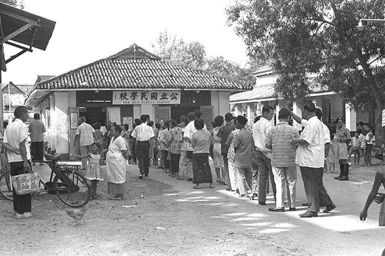 Queuing up to cast a vote on the options of merger during Singapore National Referendum Day 1962