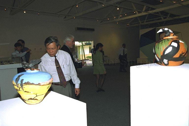 Vietnam's Minister for Culture and Information Nguyen Khoa Diem, who is on a four-day visit to Singapore from April 7 to 10, viewing exhibits during tour of LASALLE-SIA College of the Arts at 90 Goodman Road