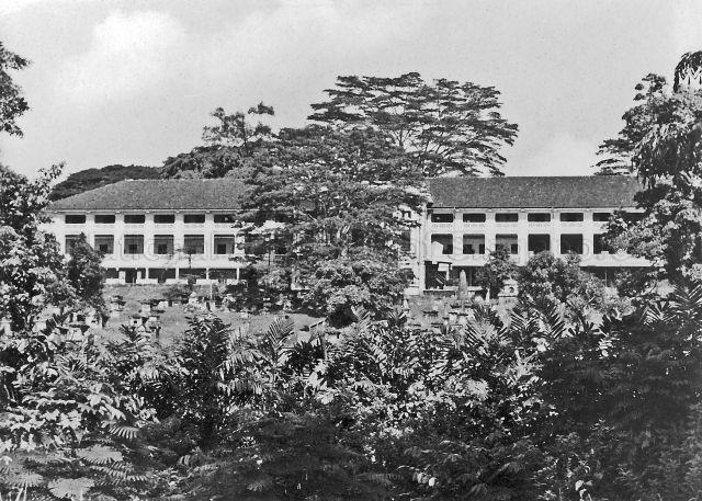 Fort Canning Barracks,the headquarters of the British Armed Forces in Singapore, with cemetery in front, c.1950s
