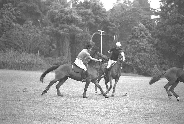 Prince Charles and Ken Buchanan in a friendly polo match at the Singapore Polo Club. Prince Charles is in Singapore to join the frigate HMS Jupiter at ANZUK Naval Base as a naval lieutenant.