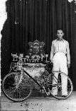 Haji Marwadi with his trophies and bicycle