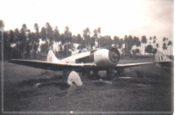 Photograph of a damaged Hawker Tempest aircraft, Romeo, discarded as scrap