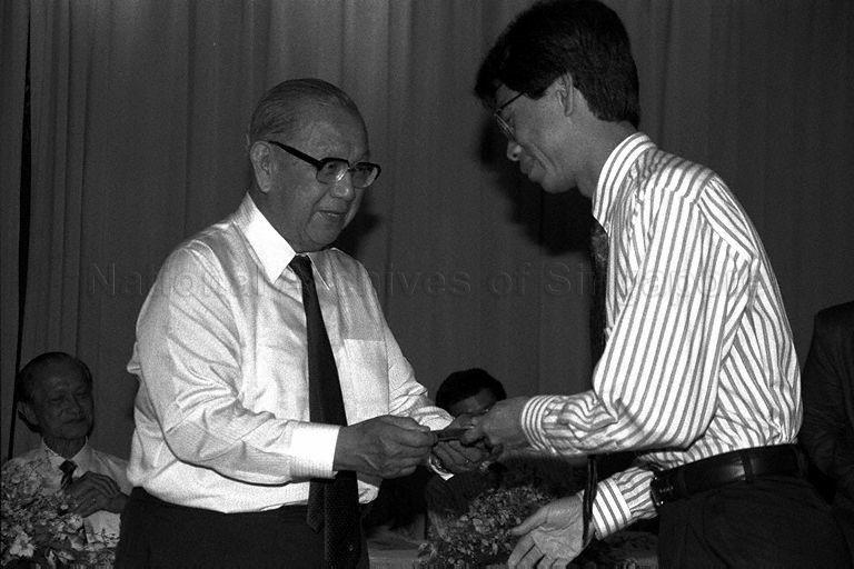President of both Singapore Council of Social Service and Community Chest Ee Peng Liang presenting token of appreciation during the launch of Volunteers' Month cum opening of charity bazaar at Mandarin Hotel in Orchard Road