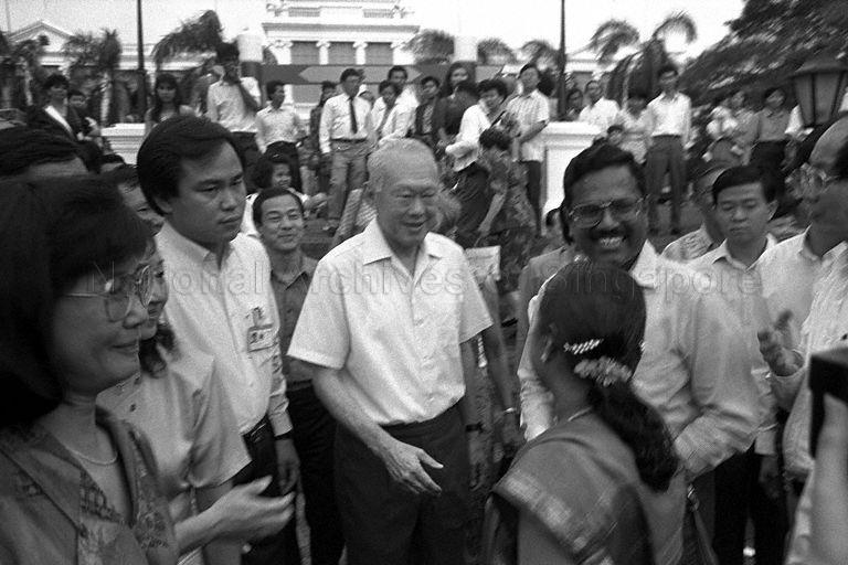 Senior Minister Lee Kuan Yew being greeted by guests on arrival at the Istana grounds to attend Chinese New Year Garden Party hosted by Prime Minister Goh Chok Tong and his Cabinet
