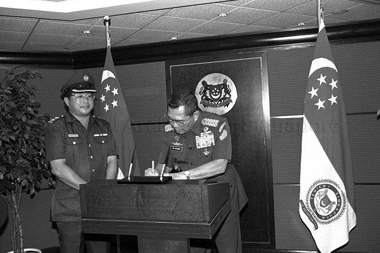 Outgoing Commander-in-Chief of Indonesian Armed Forces General Try Sutrisno signing guest book during his courtesy call on Minister for Defence Dr Yeo Ning Hong at Ministry of Defence, Gombak Drive 