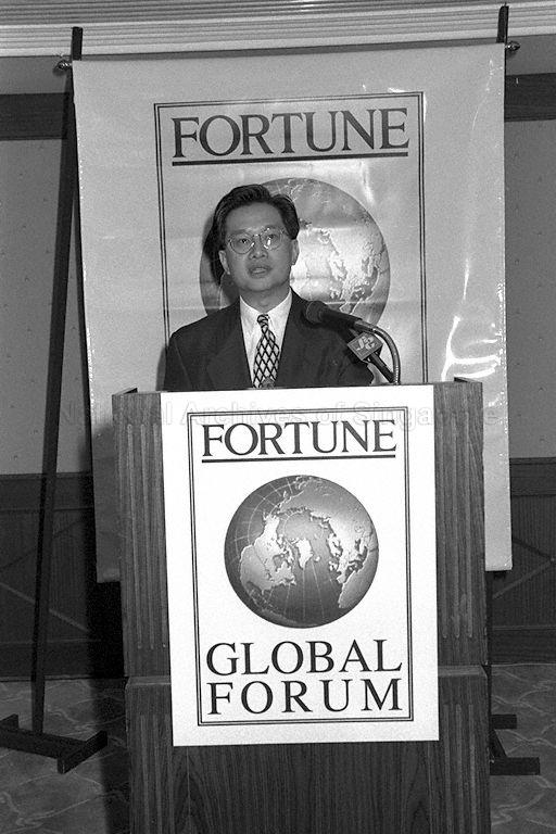 Chairman of Singapore Tourist Promotion Board Edmund Cheng Wai Wing speaking at signing ceremony for a three-day 1995 Fortune global forum in Singapore held at York Hotel