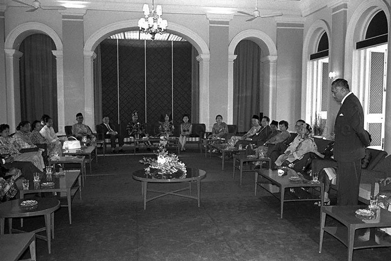 Yang Di-Pertuan Negara of Singapore Yusof Ishak addressing Zubir Said, composer of Singapore's National Anthem, his family members and guests at a reception for the composer's daughter and son-in-law in Istana Negara