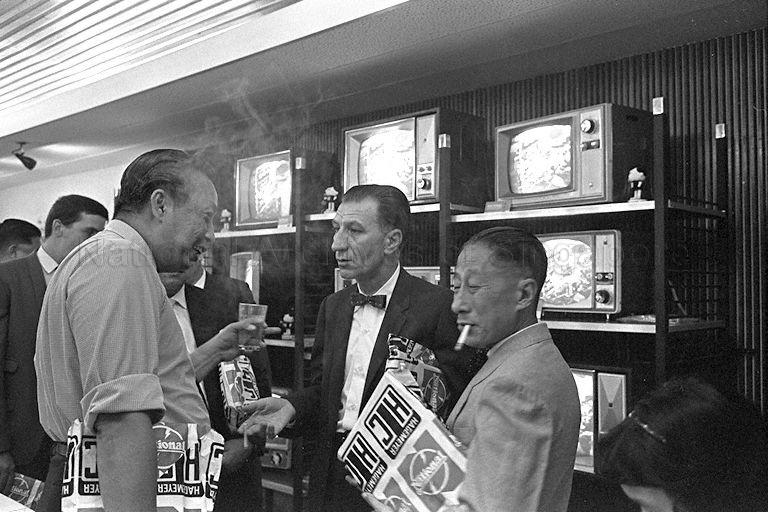 Guests attending opening of neon tower annex of National showroom on North Bridge Road by Minister for Culture S Rajaratnam