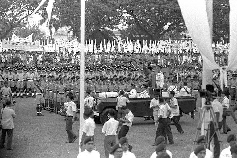 National Day 1963 at the Padang - Yang Di-Pertuan Negara of Singapore Yusof Ishak inspecting contingents in a Land Rover