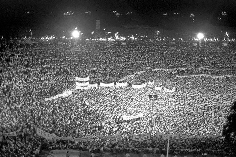 Rally of more than 100,000 people of all races at the Padang organised by Chinese Chamber of Commerce to press for reasonable settlement of a Japanese atonement gesture for wartime atrocities