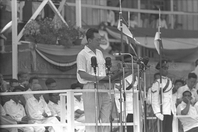Prime Minister Lee Kuan Yew reading the Malaysia proclamation during Malaysia Day celebrations at City Hall