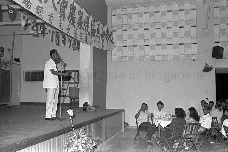 A People's Action Party (PAP) official delivering a speech at the General Election victory dinner at Bukit Timah Community Centre, 7 milestone Bukit Timah Road