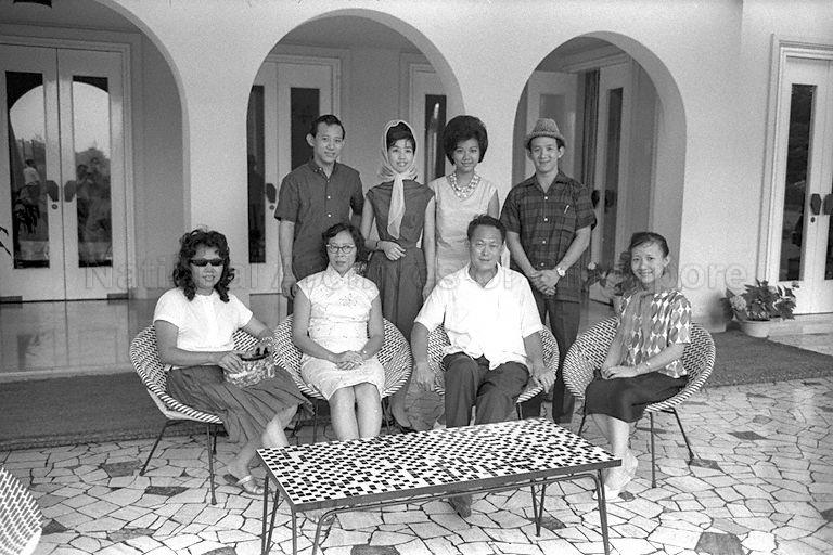 Group photograph of Prime Minister and Mrs Lee Kuan Yew with members of Singapore Cultural Mission at Rumah Temasek. The mission arrived at Kuala Lumpur to perform at the reception marking opening of Rumah Temasek on 1 November, and at opening of first Parliamentary Meeting on 2 November.