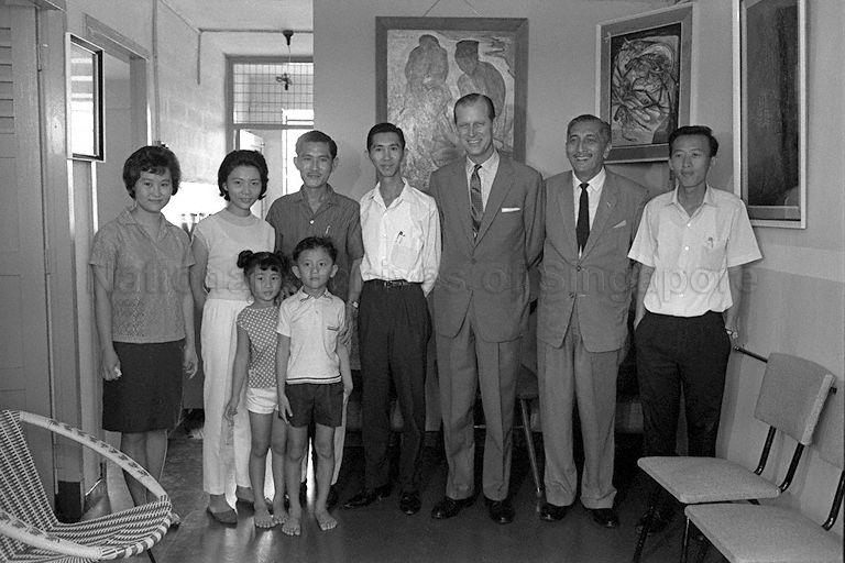 Group photograph of Duke of Edinburgh Prince Philip and Yang Di-Pertuan Negara Yusof Ishak taken with the See family during the Duke of Edinburgh's two-day state visit to Singapore