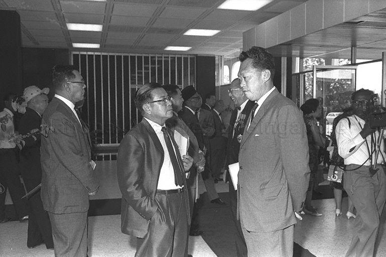 Prime Minister of Singapore Lee Kuan Yew chatting with Chairman of Sarawak United People's Party (SUPP) Ong Kee Hui at the opening of Parliament in Kuala Lumpur