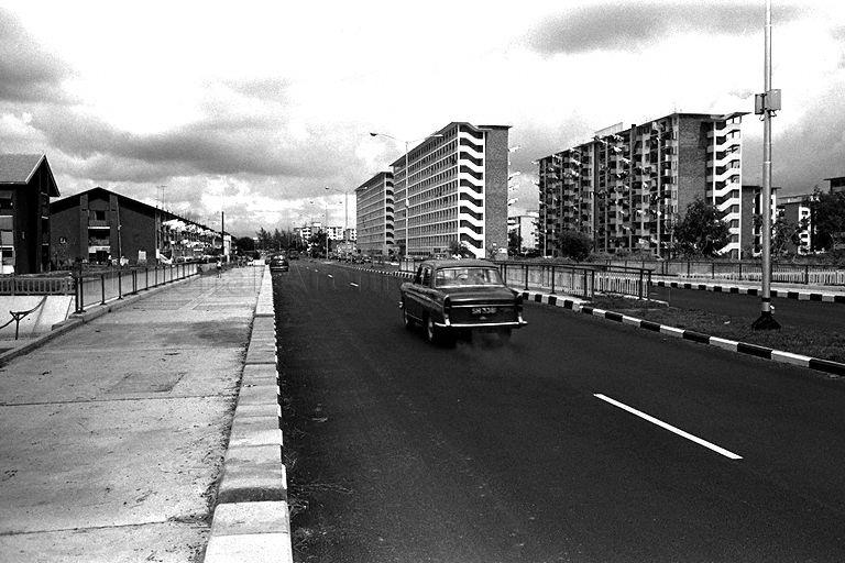 Old Airport Road with flats at Dakota Crescent (left) and