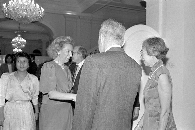 Prime Minister and Mrs Lee Kuan Yew welcoming Mrs Eugenia Goria when she arrives at Istana with her husband, Italian Prime Minister Giovanni Goria, to attend dinner given in their honour