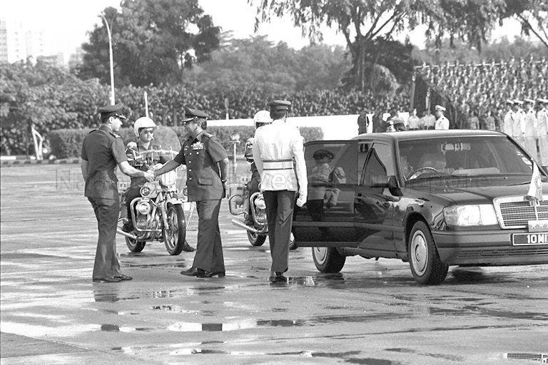Chief of the General Staff Lieutenant General Winston Choo (centre) being greeted on arrival at Paya Lebar Airport to attend Singapore Armed Forces (SAF) Day ceremony