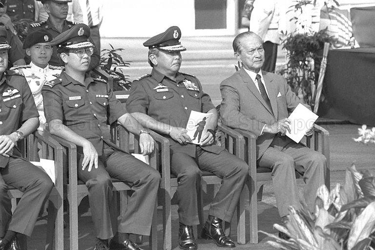 President Wee Kim Wee with Chief of the General Staff Lieutenant General Winston Choo (second from right) and Deputy Chief of General Staff (Army) Brigadier-General Boey Tak Hap at military parade to mark Singapore Armed Forces (SAF) Day at Paya Lebar Airport