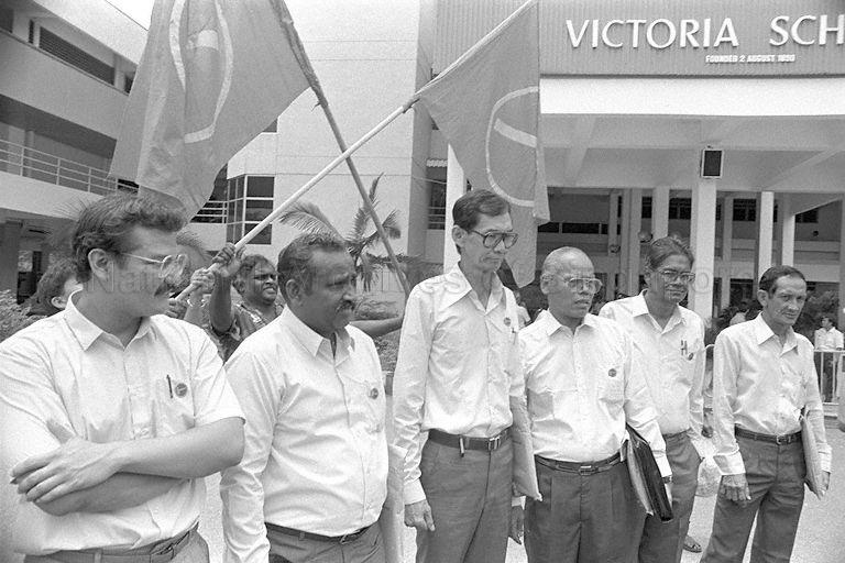 General Election 1988 - Workers' Party (WP) candidates at Victoria School, the nomination centre for Jalan Besar Group Representation Constituency (GRC) and single member constituencies of Kallang, Kampong Glam, Moulmein, Mountbatten and Whampoa, on nomination day. The WP candidates are, from left, Frederick De Wind (Kampong Glam), Balakrishnan Ananthan (Moulmein), Toh Keng Thong (Jalan Besar GRC), Mohamad bin Idris (Jalan Besar GRC), A L Sundram (Kallang) and Marah Edmund Richard (Jalan Besar GRC).
