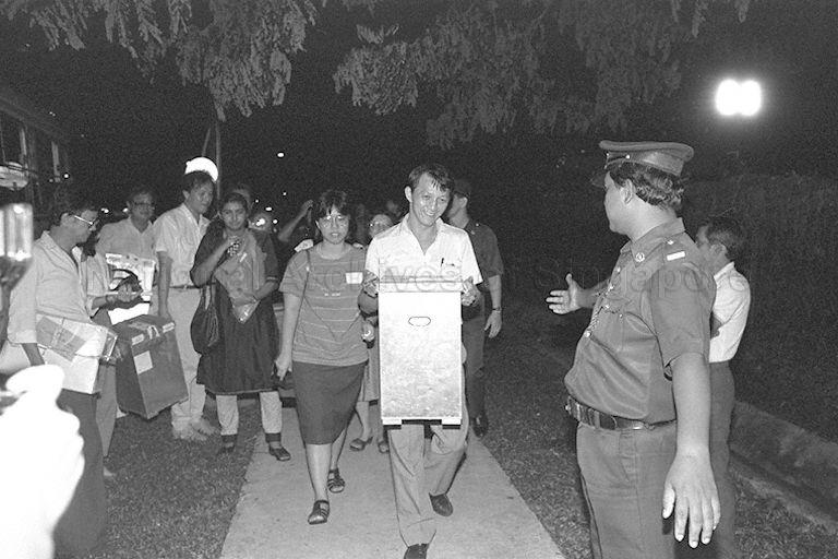 General Election 1988 - Sealed ballot boxes arriving at Geylang Methodist Secondary School, the counting centre for Aljunied, Hougang, MacPherson, Punggol and Paya Lebar constituencies.