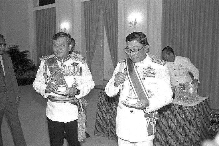 Acting Supreme Commander of the Royal Thai Armed Forces General Chavalit Yongchaiyudh (right) with Singapore Armed Forces' (SAF) Chief of the General Staff Lieutenant-General Winston Choo (left) during reception after the investiture ceremony at Istana