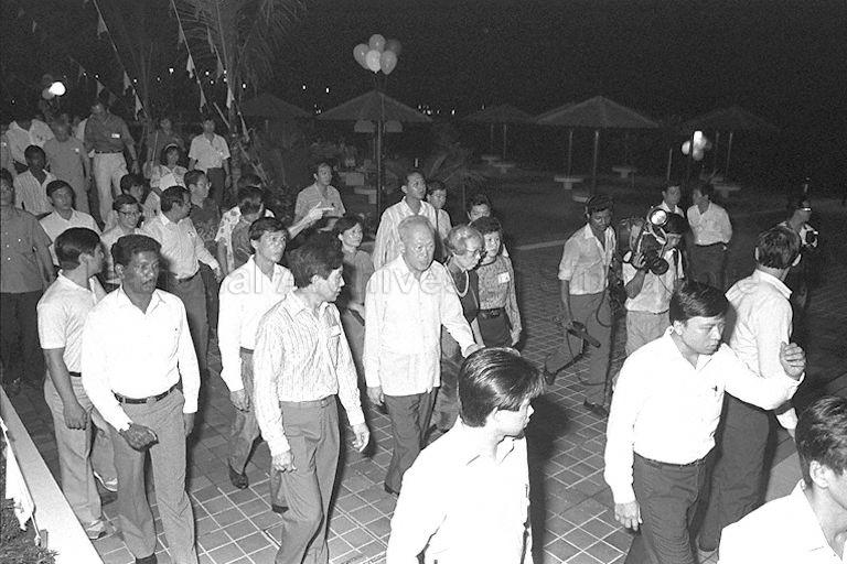 Prime Minister (PM) Lee Kuan Yew and Mrs Lee touring NTUC Pasir Ris Resort, accompanied by the resort's chairman Alan Choe (PM's right).