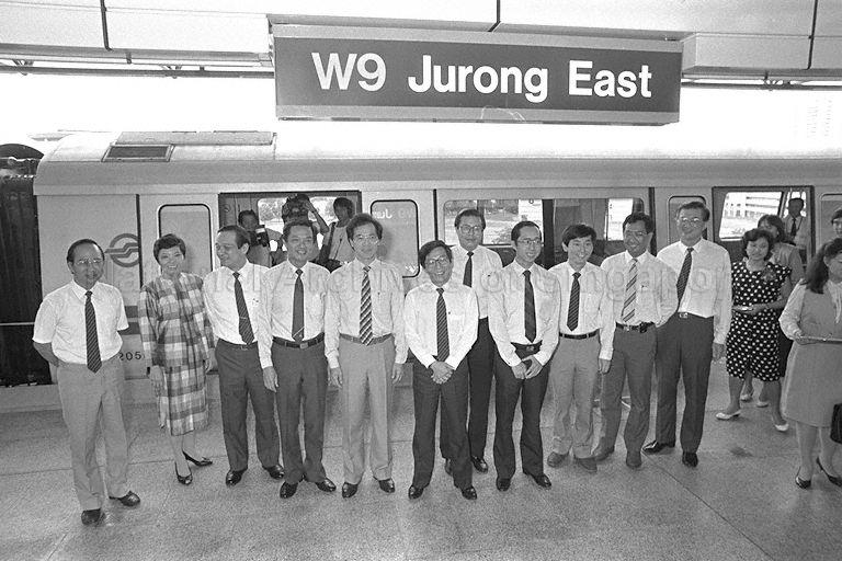 A line-up of 11 VIPs (Very Important Persons), led by Minister for Communications and Information Dr Yeo Ning Hong, getting ready to cut ribbon at opening ceremony to mark the extension of Mass Rapid Transit (MRT) system by three more stations on western line. The three new stations are Jurong East, Chinese Garden and Lakeside. From left are Member of Parliament (MP) for Ayer Rajah Dr Tan Cheng Bock, MP for Yuhua Yu-Foo Yee Shoon, Chairman of MRT Corporation (MRTC)  Michael Fam, Dr Yeo, Acting Health Minister Yeo Cheow Tong, Minister of State for Communications and Information Mah Bow Tan, Chairman of Singapore MRT (SMRT) Fock Siew Wah, MP for Boon Lay Goh Chee Wee, MPs for Hong Kah Group Representation Constituency (GRC) Dr John Chen and Abdul Nasser Kamaruddin, and Executive Director of MRTC and Managing Director of SMRT Lim Leong Geok.