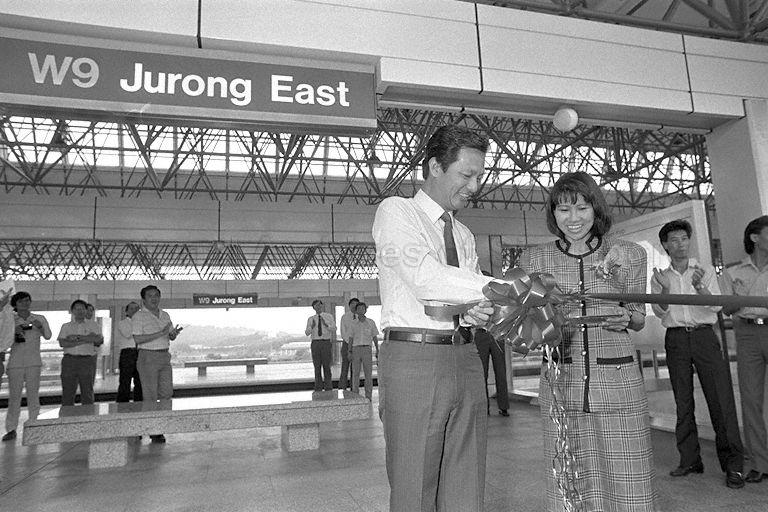 Minister for Communications and Information Dr Yeo Ning Hong cutting ribbon at opening ceremony to inaugurate the extension of Mass Rapid Transit (MRT) system on western line at Jurong East station. The three new stations are Jurong East, Chinese Garden and Lakeside.