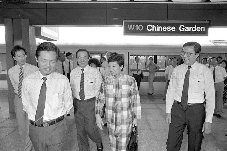 Minister for Communications and Information Dr Yeo Ning Hong, 11 VIPs (Very Important Persons) and 300 guests arriving at Chinese Garden station. Some of the VIPs from left (front) are Acting Health Minister Yeo Cheow Tong, Dr Yeo, Chairman of MRT Corporation Michael Fam, Member of Parliament (MP) for Yuhua Yu-Foo Yee Shoon, Chairman of Singapore Mass Rapid Transit (SMRT) Fock Siew Wah, and MP for Ayer Rajah Dr Tan Cheng Bock (back, short-sleeve shirt).