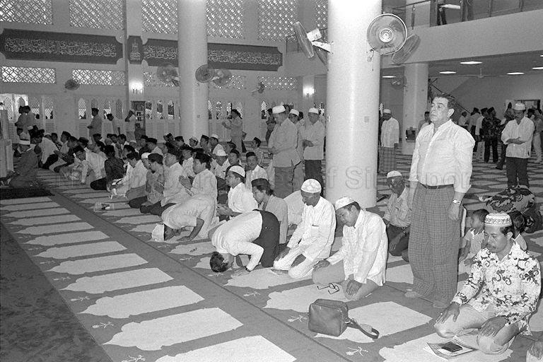 Prayer session at official opening of Al-Falah Mosque in Bideford Road, off Orchard Road.