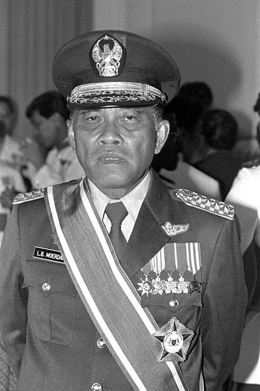 Indonesian Armed Forces Commander-in-Chief General Benny Murdani showing his award, a red-and-white sash with a gold and silver badge and a gold and silver star on his breast pocket. The General is the first person to be conferred Singapore's highest military award. He is nominated for it by the Singapore Government for his role in promoting closer ties between the Singapore Armed Forces and the Angkatan Bersenjata Republik Indonesia, the Indonesian armed forces.