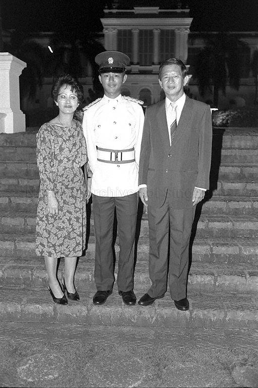 President's Scholar Low Pat Chin and parents at Istana after the President's Scholarship awards ceremony