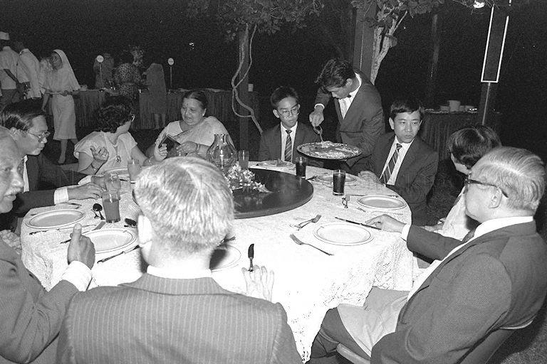 Member of Parliament for Changkat Dr Aline Wong (second from right) attending the dinner after the President's Scholarship awards ceremony. Sitting two seats away on her left is scholar Wong Tien Yin, who is also her elder son.