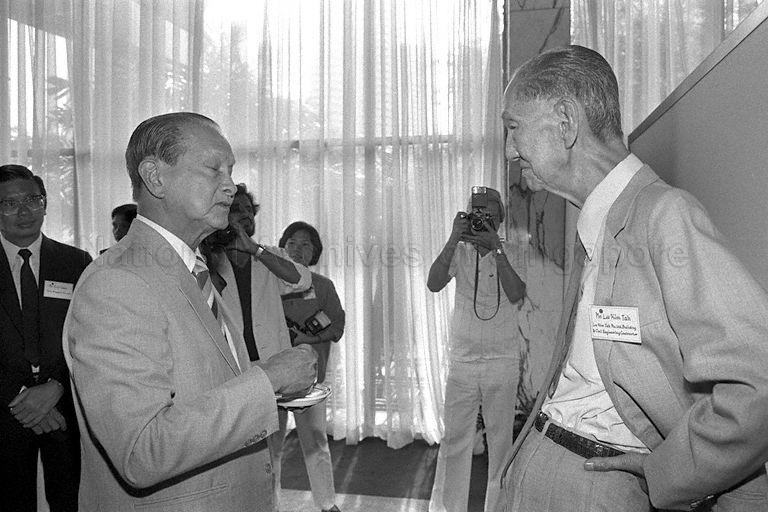 President Wee Kim Wee in conversation with guest Lee Kim Tah during opening of Ninth Senior Citizens' Week at Shangri-La Hotel
