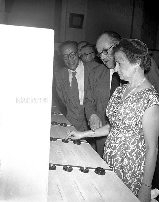 Chief Justice Sir Charles Murray-Aynsley (second from right), who officiates at the opening ceremony, and wife viewing exhibits during visit to the third annual safety first exhibition at Victoria Memorial Hall. The exhibition was organised by Singapore Safety First Council and Public Relations Department.