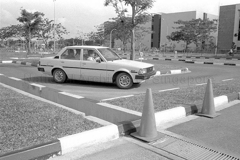 Minister for Home Affairs and Second Minister for Law Professor S Jayakumar making a round on the test circuit after opening Kampong Ubi Driving Test Centre