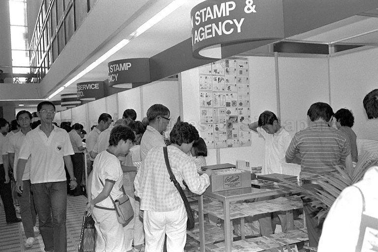 Visitors viewing stamp exhibits at stamp exhibition held in