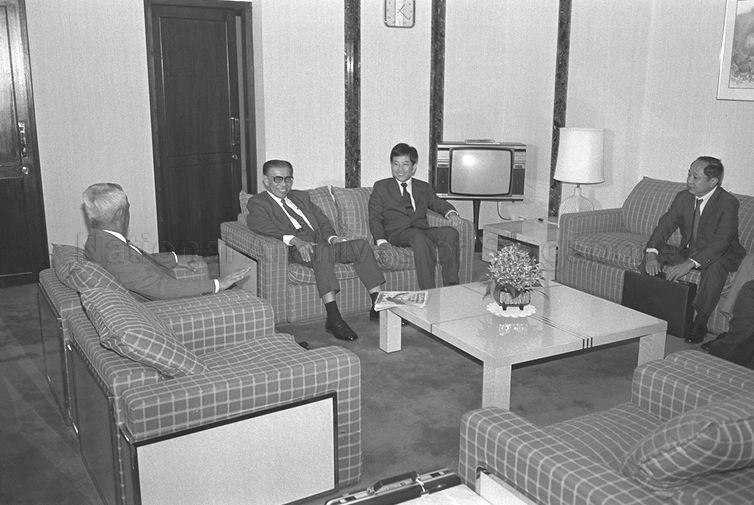 Burmese Prime Minister U Maung Maung Kha (second from left) with Parliamentary Secretary to Ministry of Education Tang Guan Seng (second from right) when the Burmese Prime Minister arrives for a four-day visit to Singapore