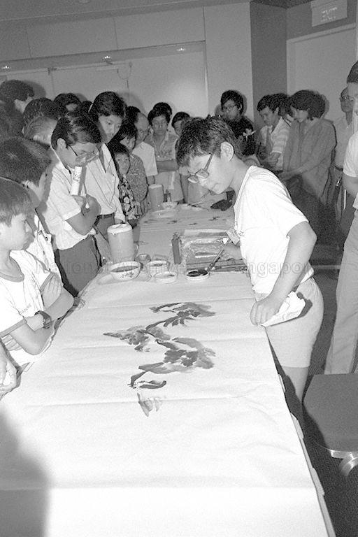 Child artist Ma Ling demonstrating his talent during opening of Artistic Exchange event held by Cultural and Artistic Goodwill delegation of the People's Republic of China at Westin Plaza. 