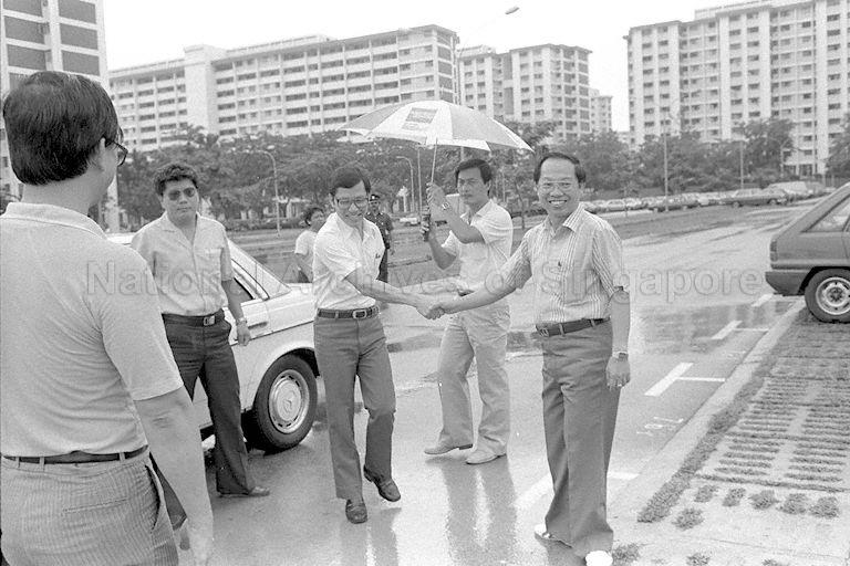 Acting Minister for Labour and Member of Parliament for Cheng San, Lee Yock Suan (front, third from left), being greeted on his arrival for Tree Planting Day at open space bound by Block 537 and Block 538, Ang Mio Kio Avenue 5.