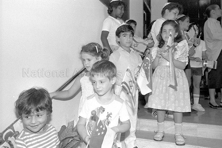 Jewish children at Maghain Aboth Synagogue in Waterloo Street awaiting arrival of Israeli President Chaim Herzog, who is in Singapore for a three-day visit on his way home after a tour of Australia, New Zealand, Fiji and Tonga