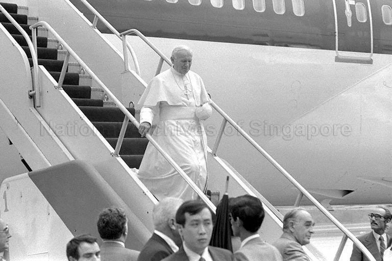His Holiness Pope John Paul II descending from his chartered plane at Singapore Changi Airport. The Pontiff arrived in Singapore for a five-hour visit.